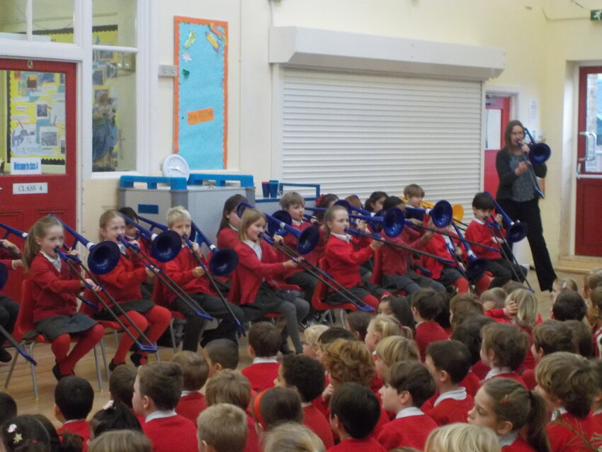 Image of Year 3  present an amazing trombone concert to the school and their parents