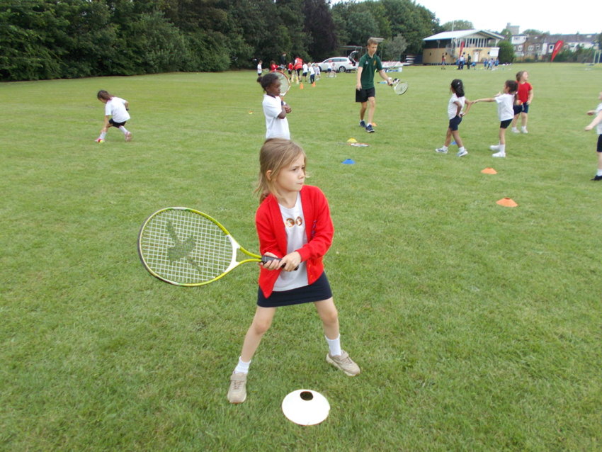 Image of Year 1 play tennis on Stovell Field