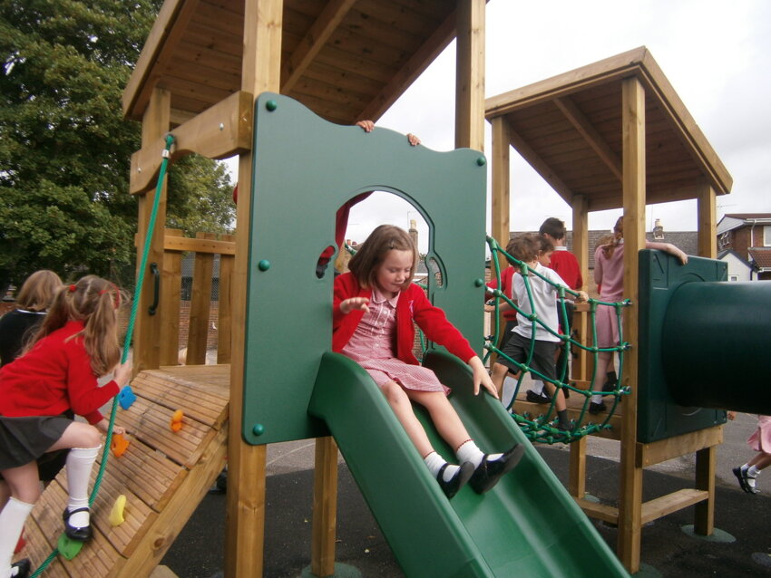 Image of Trinity St Stephen children enjoy their new playground equipment